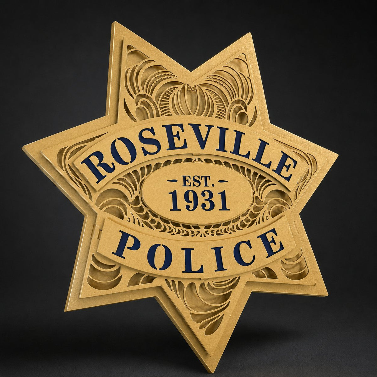 Gold police star against a dark background, Roseville Police Department by IRONiNK.