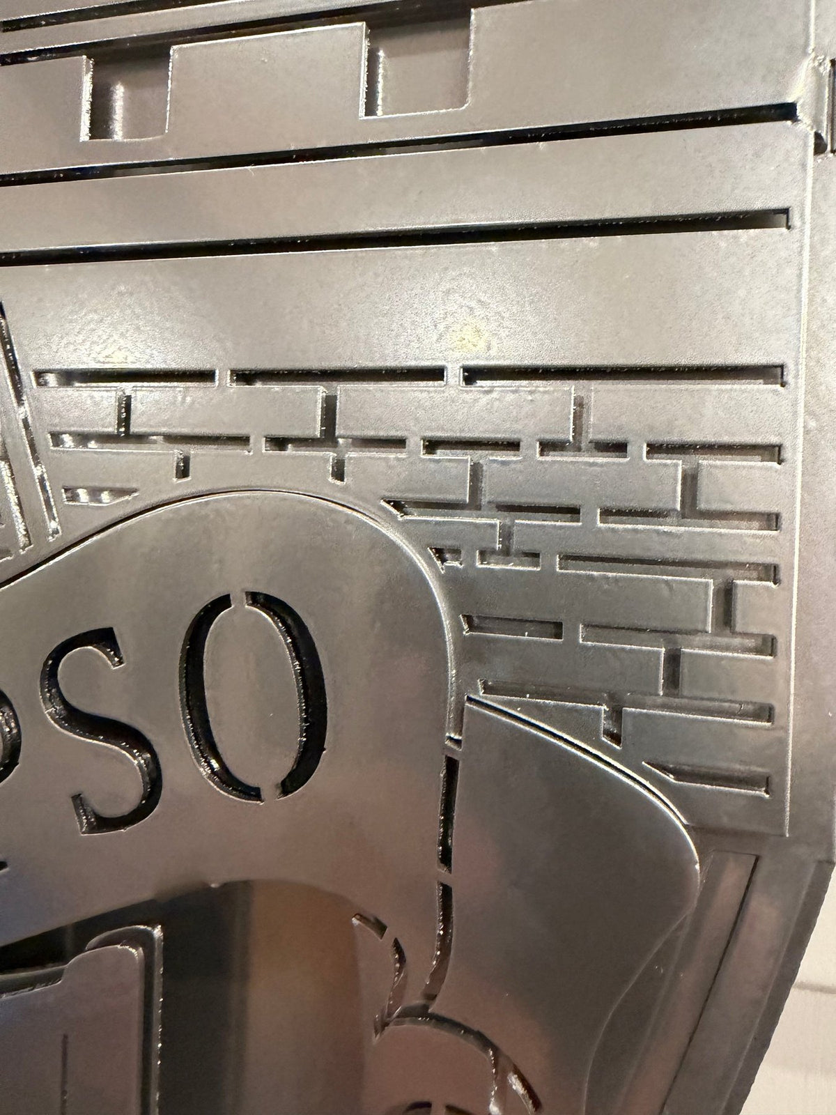 Close-up of layered metal lettering, San Luis Obispo Police Department by IRONiNK.