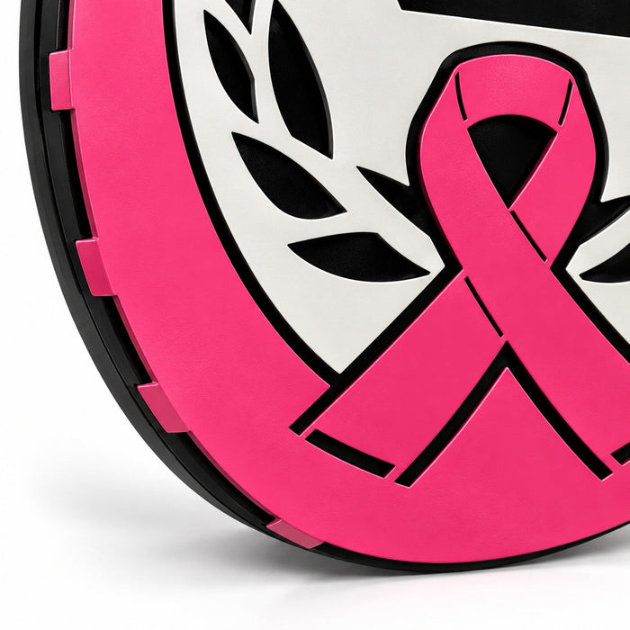 Close-up of the pink awareness ribbon and laurel leaves on the display