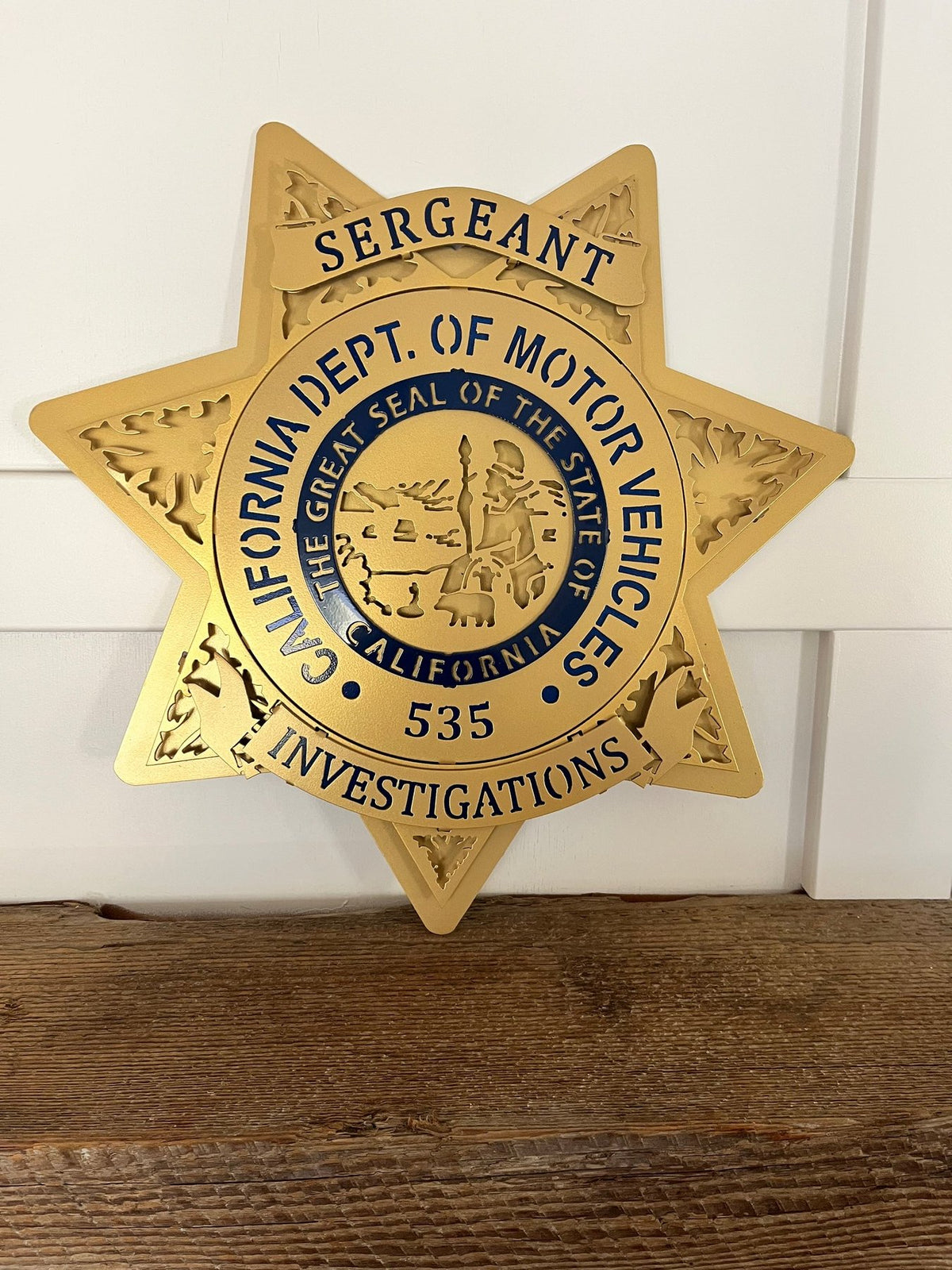 Close-up of sergeant star and badge number, California DMV Investigations by IRONiNK.