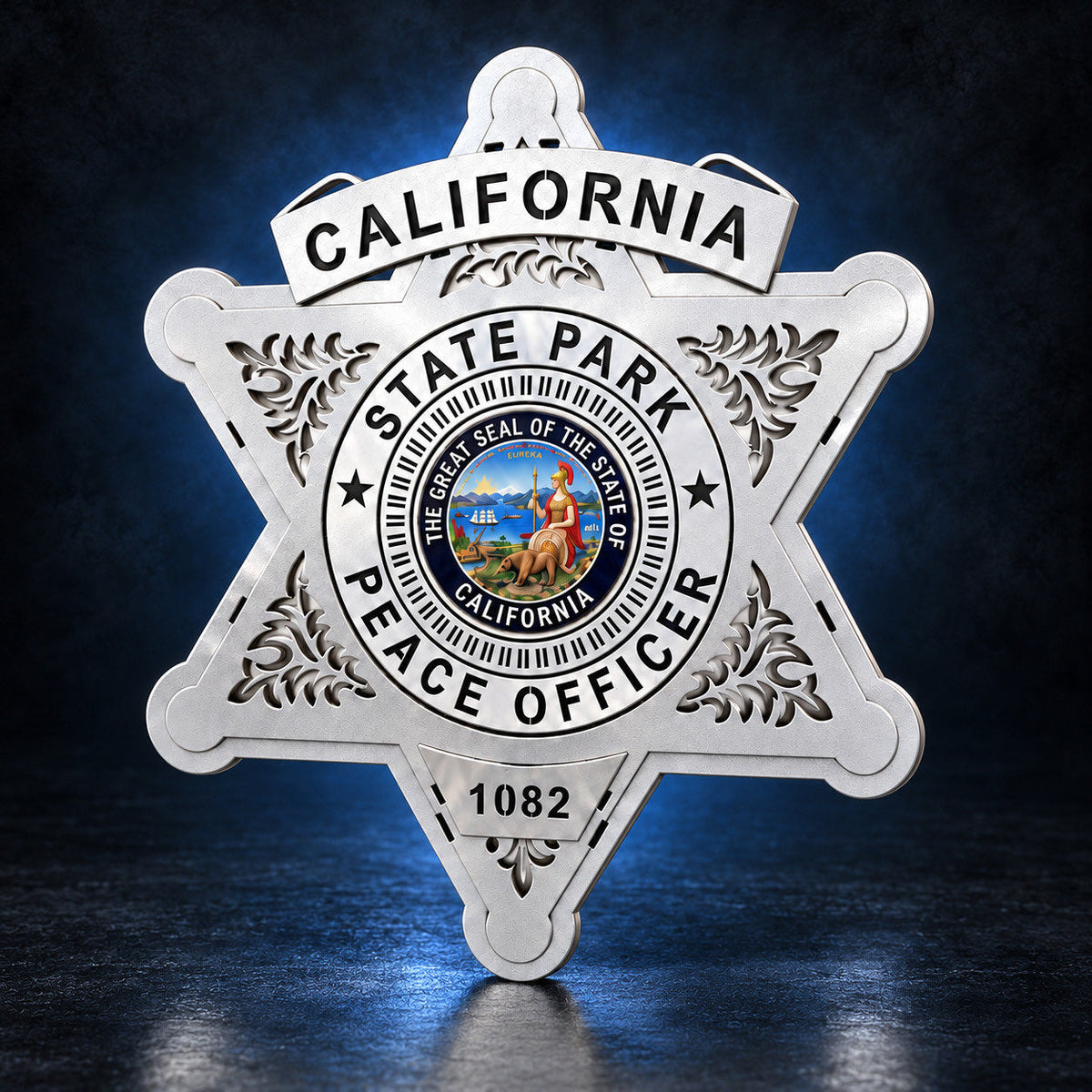 California State Parks Peace Officer star in silver on a dark blue studio background with the California state seal and a badge number