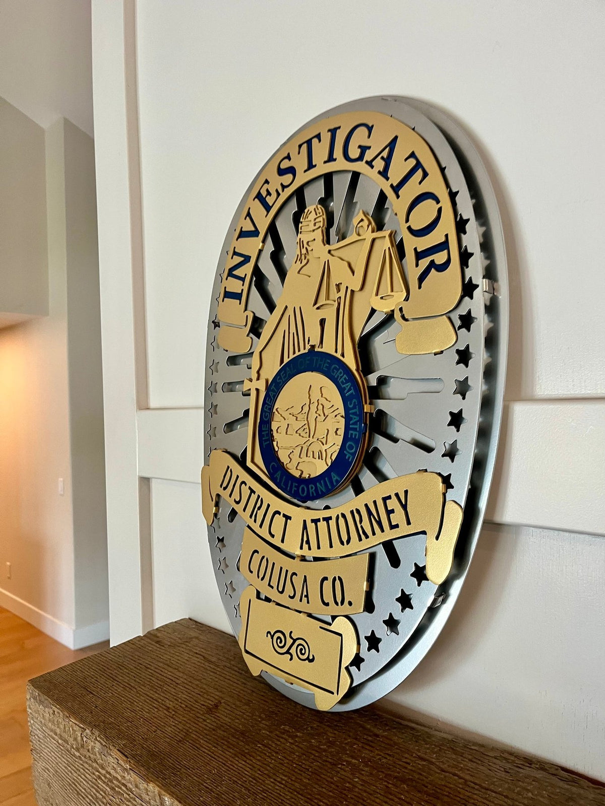 Angled view showing dimensional badge layers, Colusa County DA Investigations by IRONiNK.