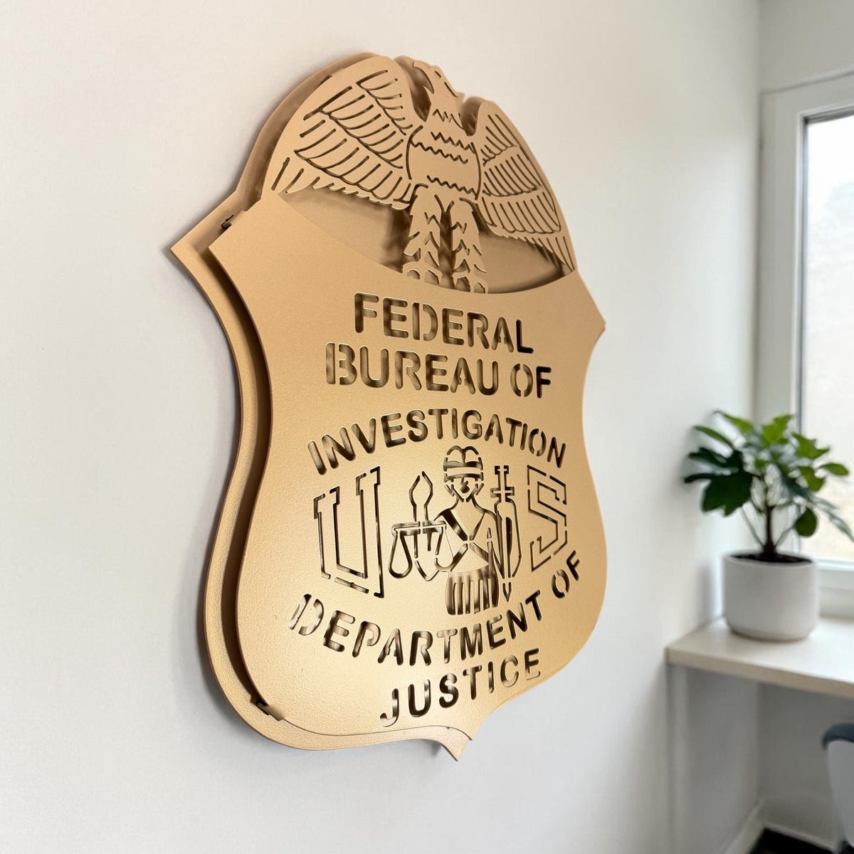 Gold FBI badge on a white interior wall, FBI Federal Bureau of Investigation Badge Sign by IRONiNK.