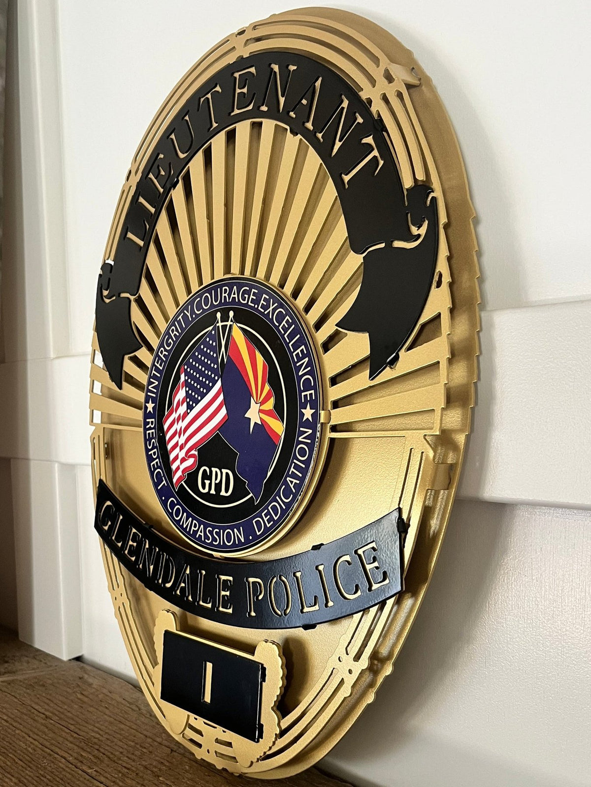 Angled view of raised gold lieutenant badge, Glendale Police Department (AZ) by IRONiNK.