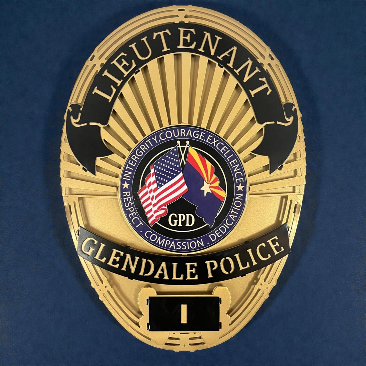 Gold lieutenant badge against a dark background, Glendale Police Department (AZ) by IRONiNK.