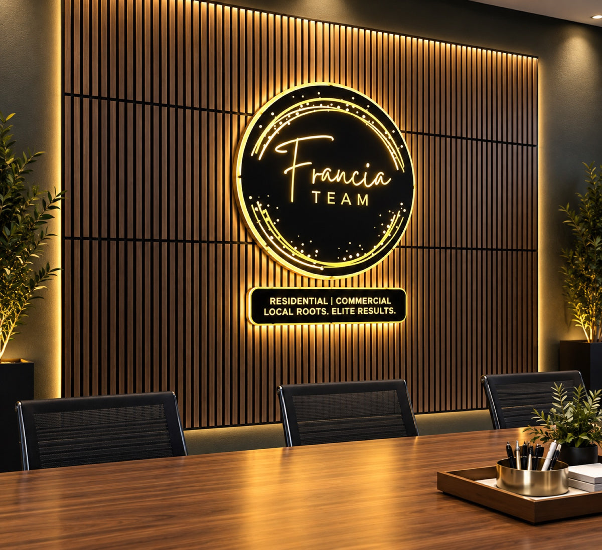 Illuminated Francia Team logo sign on a slatted wood conference room wall