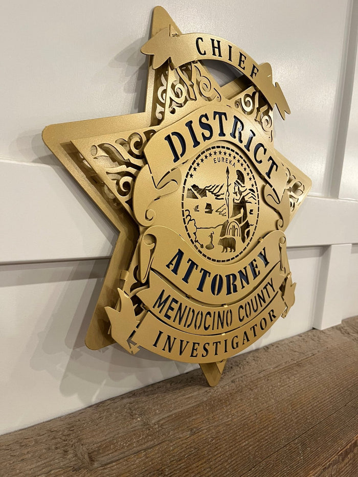 Angled view showing raised metal layers, Mendocino County DA Investigator Star by IRONiNK.