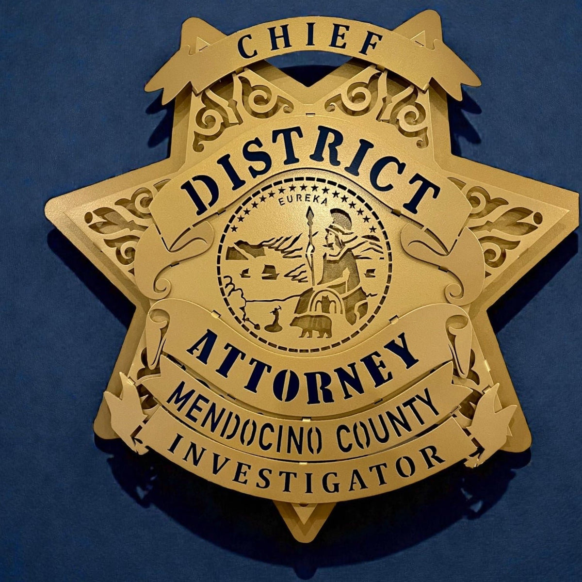 Close-up of chief investigator lettering, Mendocino County DA Investigator Star by IRONiNK.