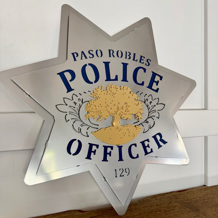 Angled view of the silver star, Paso Robles Police Badge by IRONiNK.