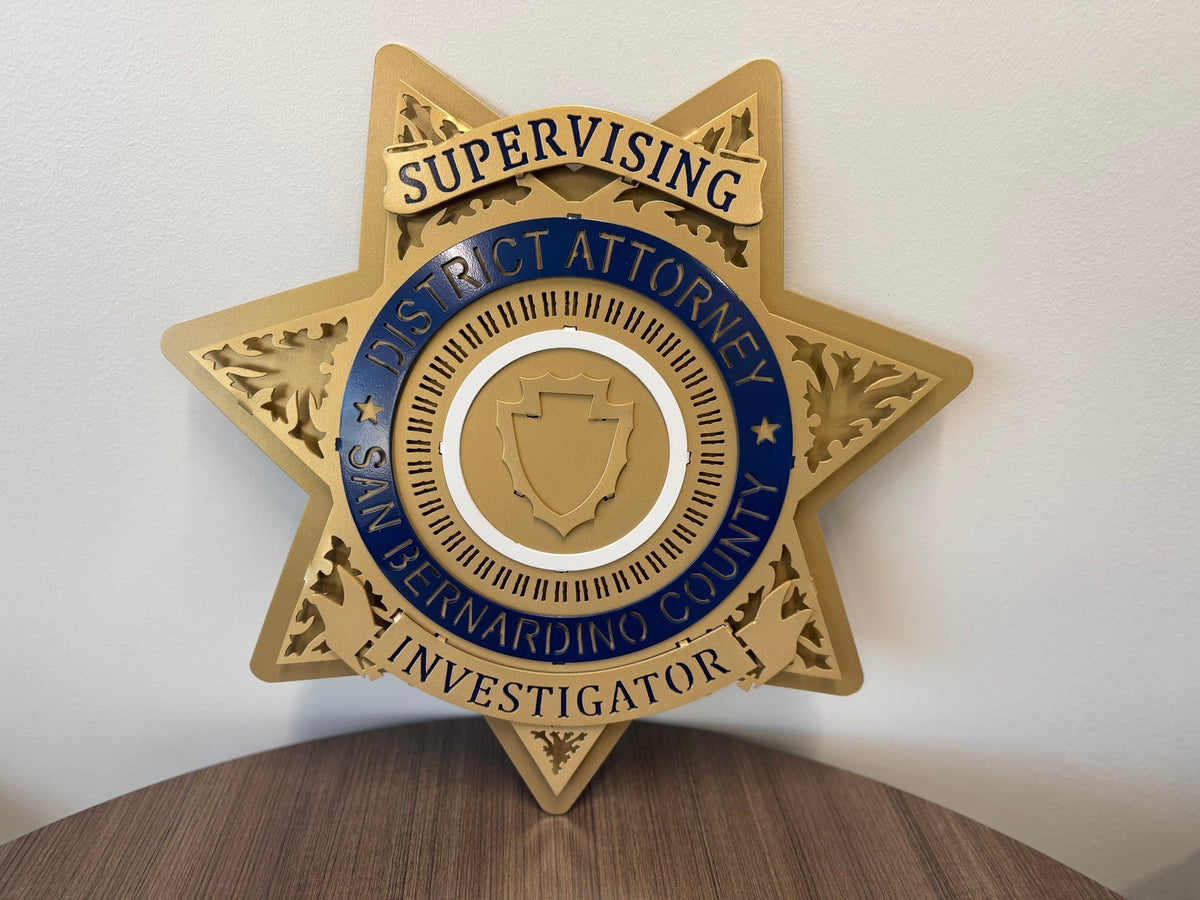 Gold star displayed on a round table, San Bernardino County DA Star by IRONiNK.