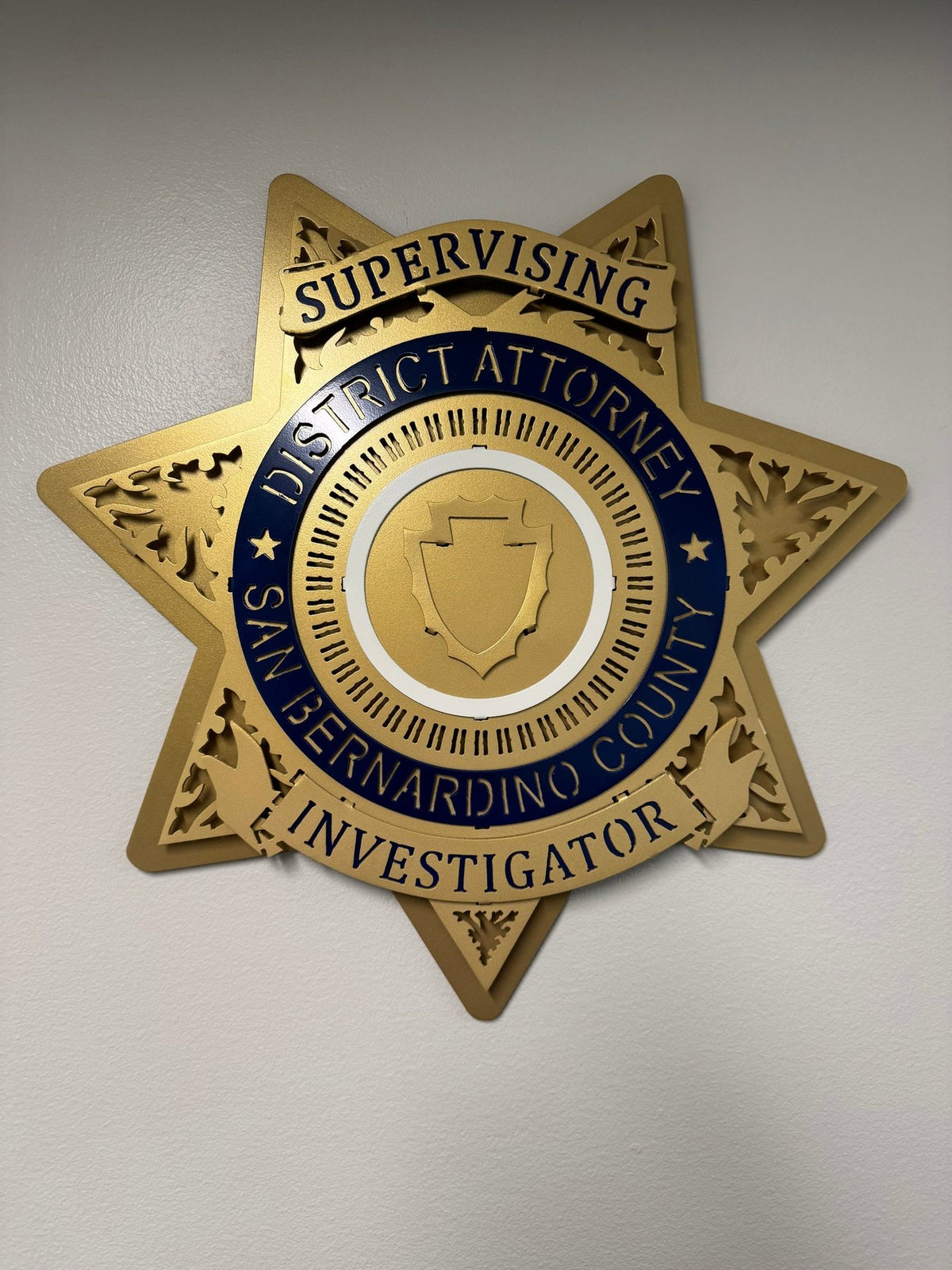Gold star on an interior wall, San Bernardino County DA Star by IRONiNK.