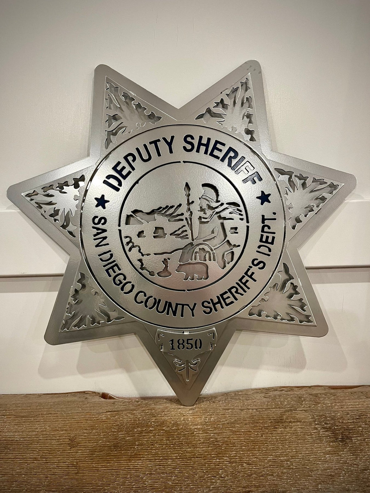 Close-up of silver deputy sheriff star, San Diego Sheriff Star by IRONiNK.