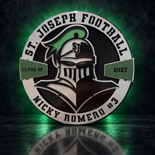 Front view of a personalized St. Joseph Knights layered metal display with a green studio glow