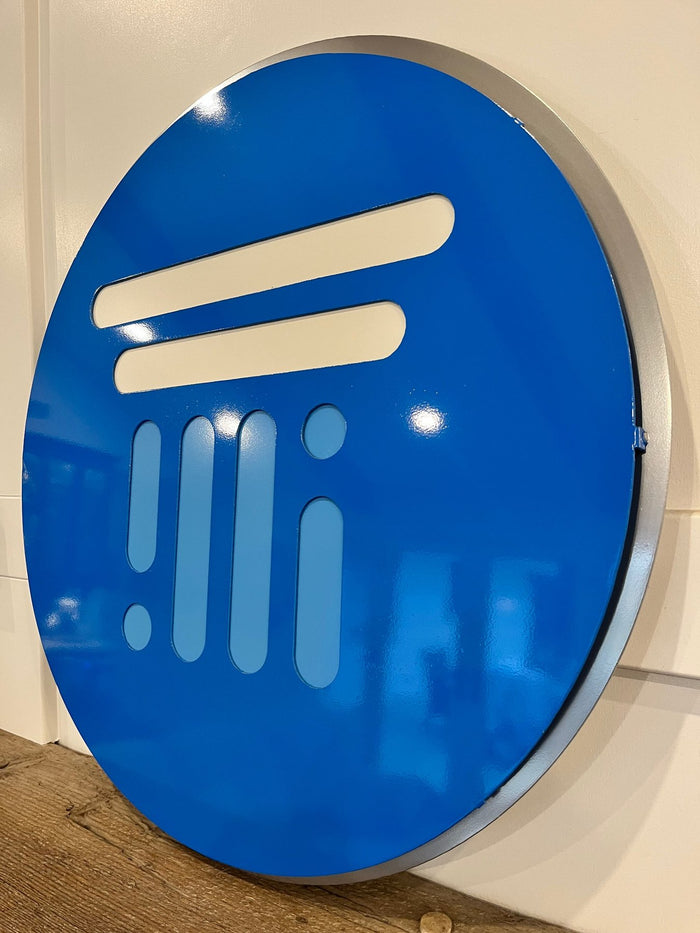 Angled view showing raised logo layers, Tranquility AI by IRONiNK.