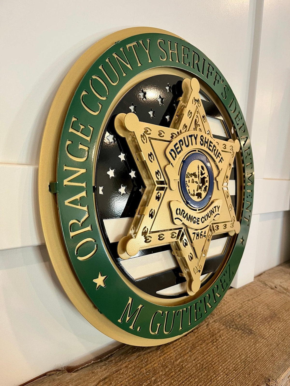 Tribute Sign: Orange County sheriff tribute with green ring.